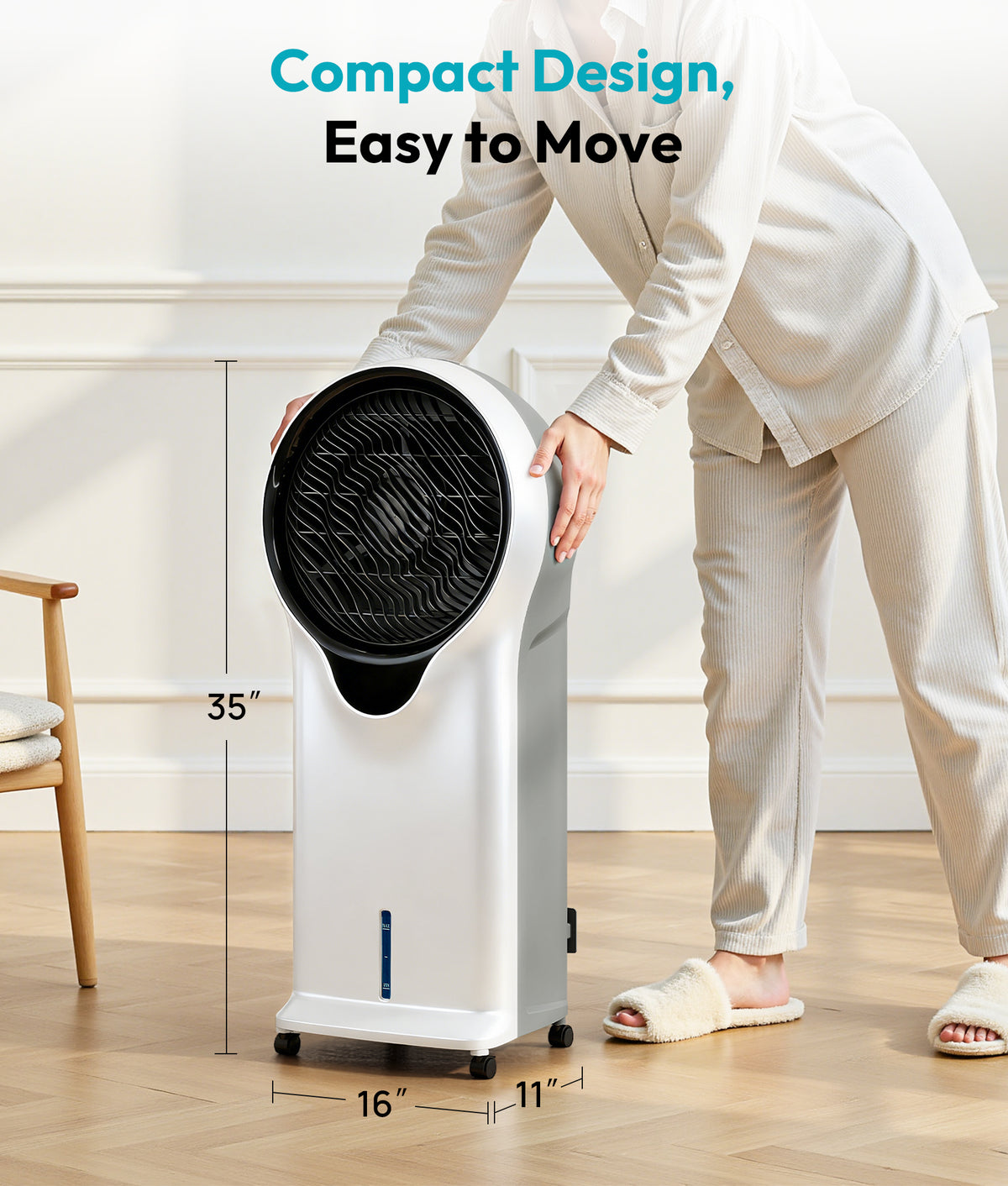 Person holding a portable air conditioner with dimensions displayed, in a minimalistic room.